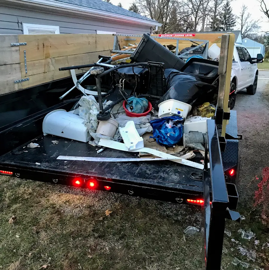 Roll-off dumpster delivered to a residential driveway in Red Oak